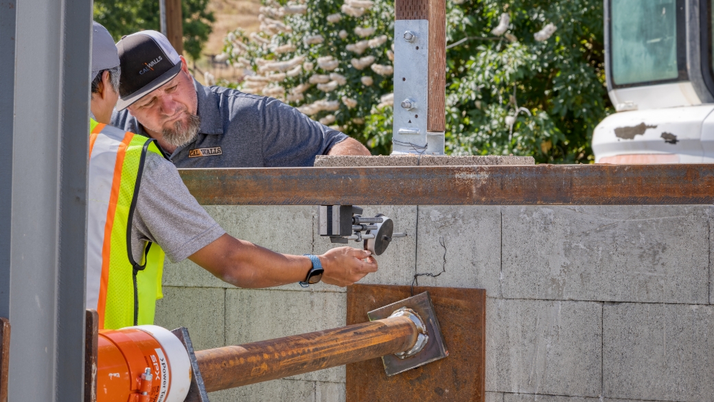 workers construction wall